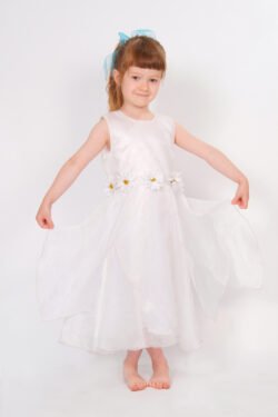 angelic studio portrait of a child in a pretty white dress with a white background